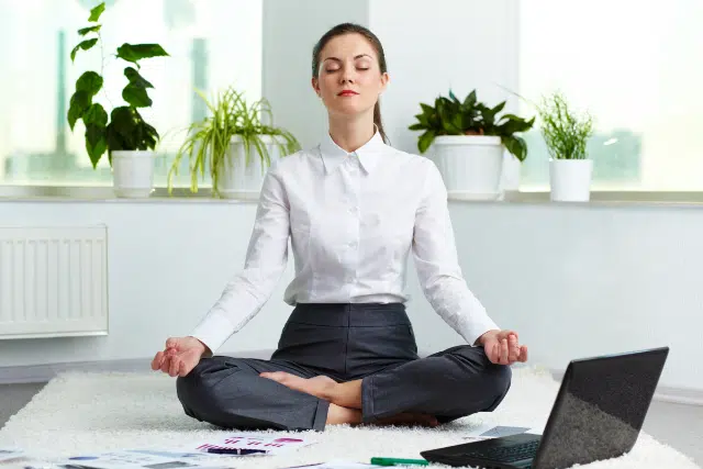worker in yoga pose