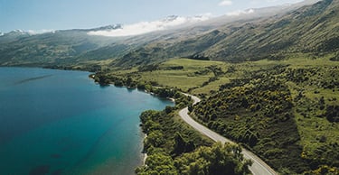 New Zealand coastal road including the shore, and the mountains