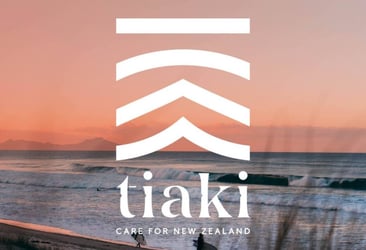 Image of a sunset with the Tiaki promise logo on top