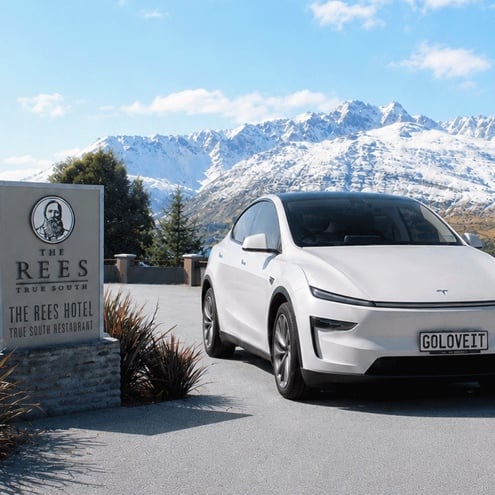Tesla Model Y Long Range parked on a scenic New Zealand road