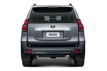 Rear image of a silver Toyota Land Cruise Prado 4x4 rental car on a white background