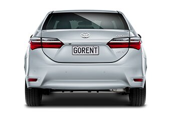 Rear image of a Toyota Corolla Touring sedan rental car on a white background