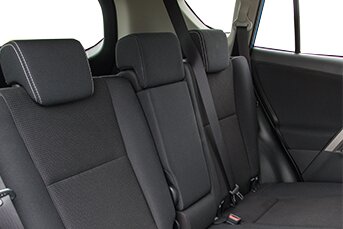 Interior image of the rear of a Toyota Rav4 showing the back seats
