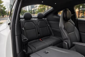 Tesla Model Y L rear passenger seats interior with black leather