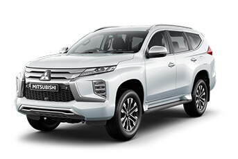 Side image of a grey Hyundai Santa Fe on a white background