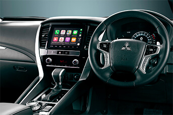 Interior image of the front of an Hyundai Santa Fe SUV showing the dashboard and entertainment system