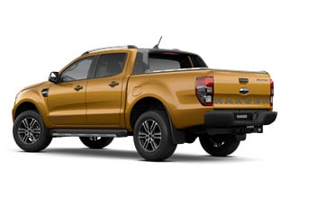 Rear and side image of a white Toyota Hilux 4x4 on a white background