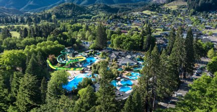 Aerial view of a hot springs resort surrounded by greenery