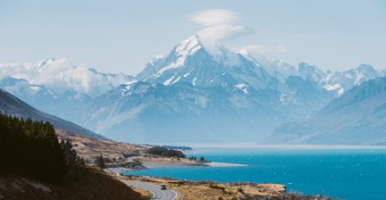 Scenic road leading to Mount Cook with a turquoise lake