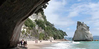 Image looking through Cathedral Cove on the Coromandel Peninsula on a sunny day