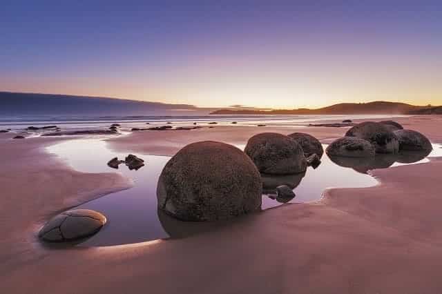 Famous Moeraki Boulders at sunrise, Koekohe beach,Otago, South Island, New Zealand
