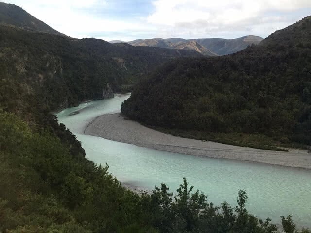 Image of the stunning river as teh TranzAlpine railway winds it way up to Arthurs Pass