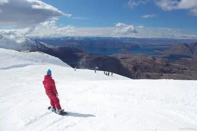 Image of a snowboarder on the ski fields above Queenstown, New Zealand