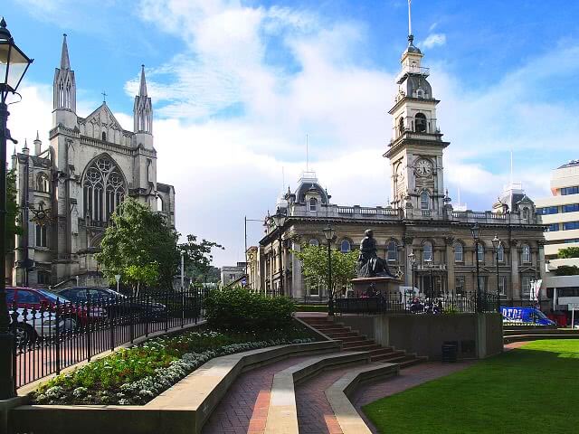 The gothic styled town hall in Dunedin with a clock tower