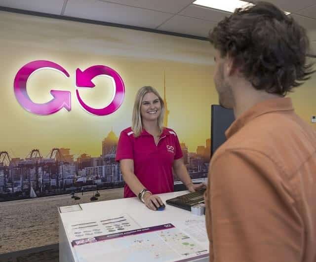 GO Rentals employee smiling at customer