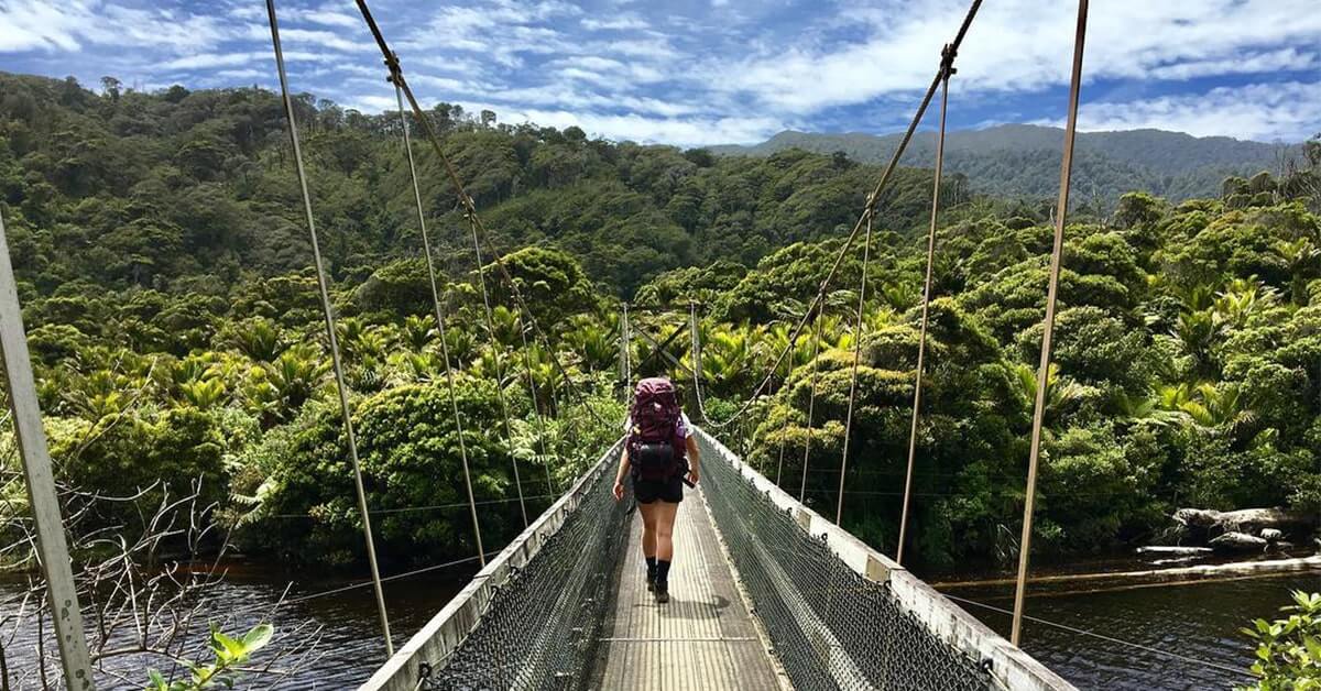 Taking on one of New Zealand's Great Walks crossing a bridge