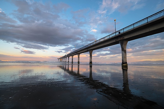 the pier at sunset at new brighton beach