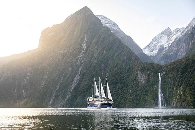 sail boat on lake marian in milford sound