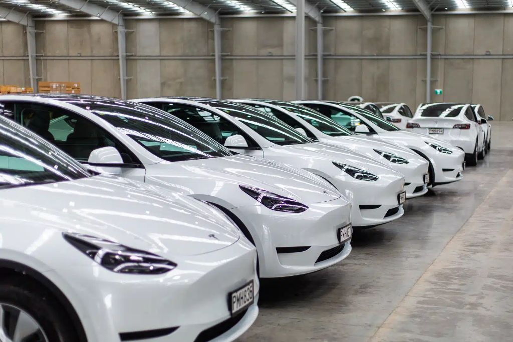 Row of white Tesla Model Ys