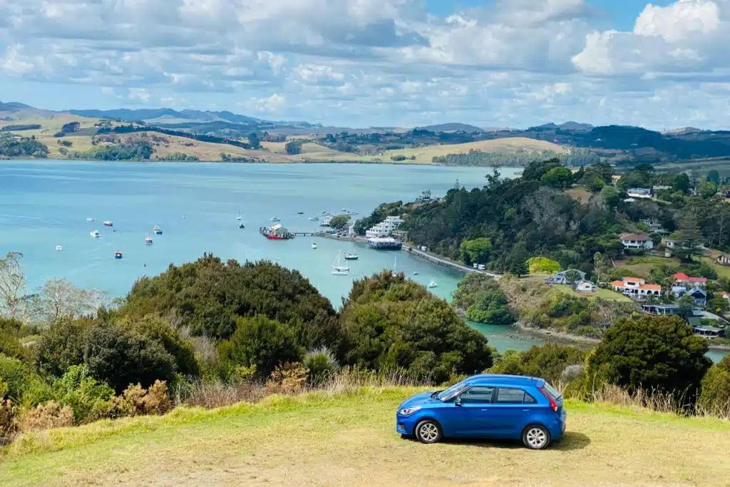 go rentals vehicle overlooking ocean view new zealand