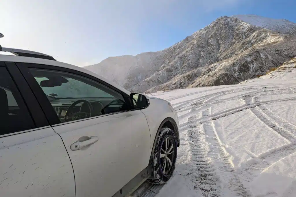 go rentals vehicle driving in winter mountain snow