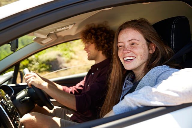 Two people inside a car